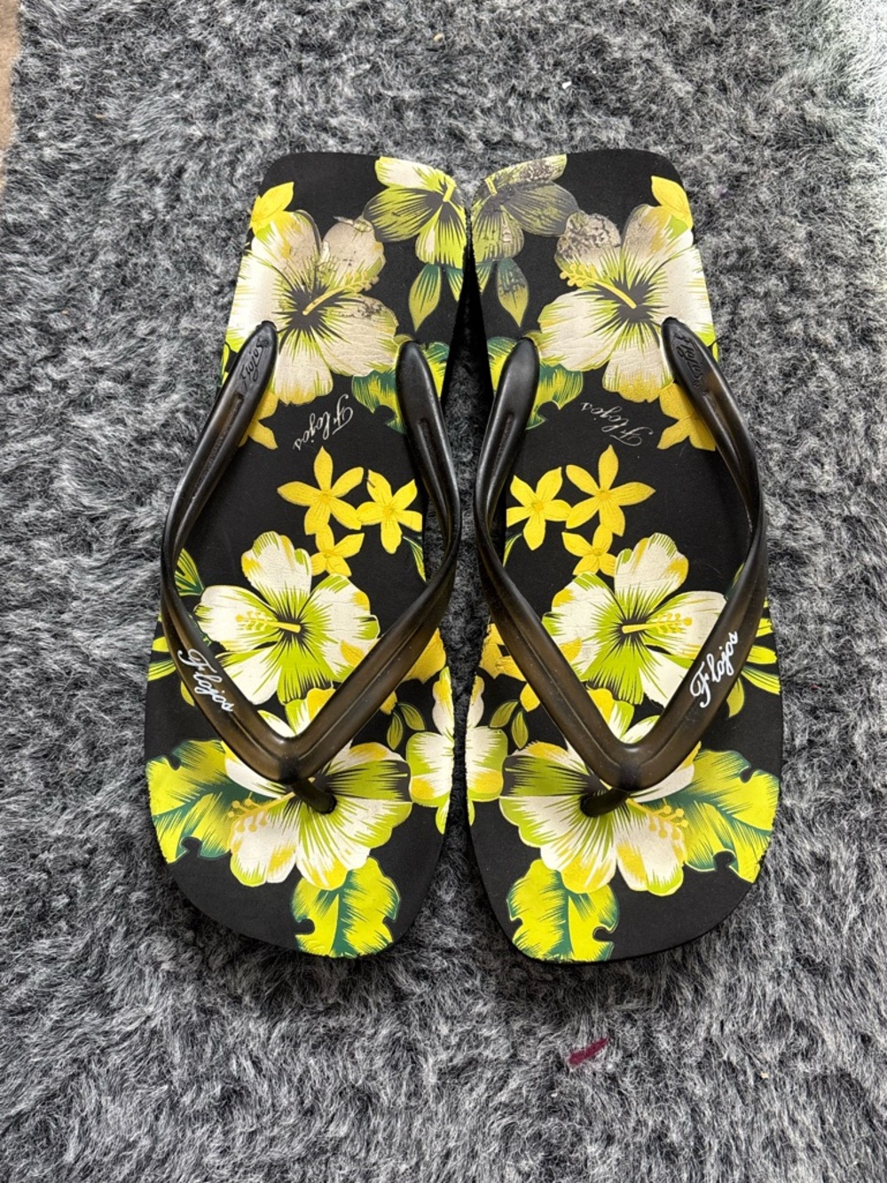 Flojos yellow and black flip flops
